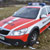 Rote Streifen in Car-Wrapfolie, Text, Logo und Linien in reflektierender Folie von 3M